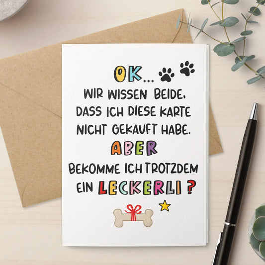 Hundekarte auf Schreibtisch – Humorvolle Klappkarte für Hundeliebhaber mit witzigem Spruch.