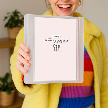 Person hält Flexibook DIN A5 „Meine Lieblingsrezepte“ rosa
