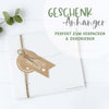 Geschenk mit Anhänger „Ein herzliches Dankeschön“ als Dekoration