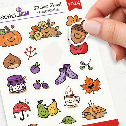 Hand löst einen Eichel-Sticker vom Herbst Sticker Sheet ab