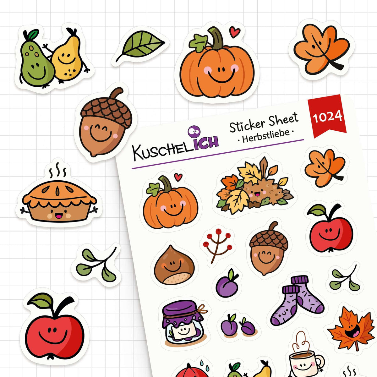 Einzelne Herbst-Sticker wie Birnen, Kürbis und Apfelkuchen neben dem Stickerbogen auf Karopapier
