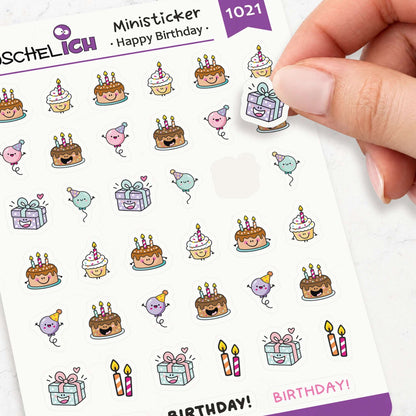 Hand löst einen Mini-Geschenk-Sticker vom Geburtstags-Stickerbogen ab