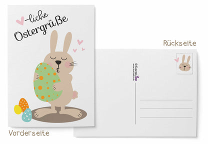 Motiv: Herzliche Ostergrüße mit Hase der Osterei küsst